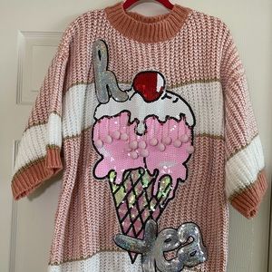 Fun sweater dress that will highlight any party!!